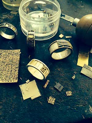 Lynda Bahr's jewelry studio with rings in process of being created
